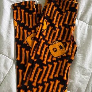Lularoe HALLOWEEN, orange and black skull leggings kids large/extra large